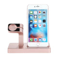White charging dock station holding iPhone and Apple Watch with cable