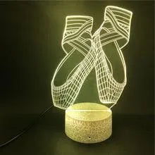 3D ballet dancer LED night light with remote control showing multiple colour options on acrylic panel.