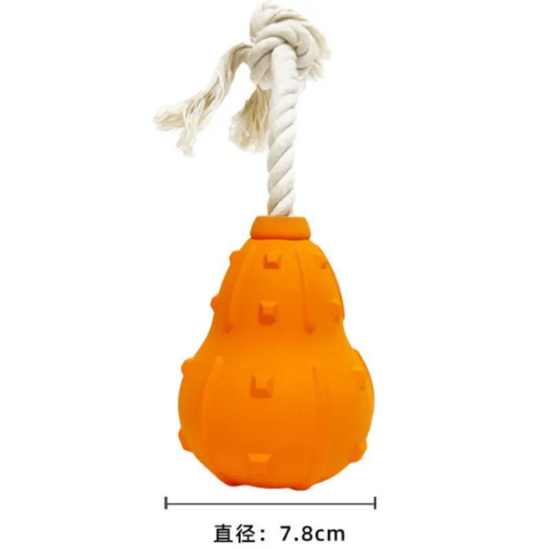 Natural rubber stuffable dog toy with a long strap for fetching, shown next to a measure showing 30cm length.