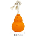 Natural rubber stuffable dog toy with a long strap for fetching, shown next to a measure showing 30cm length.