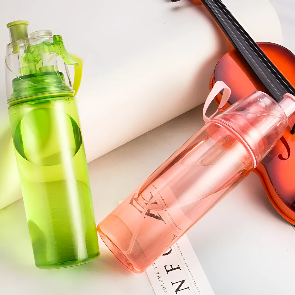 600ml spray water bottle in pink with mist function for cycling and training use