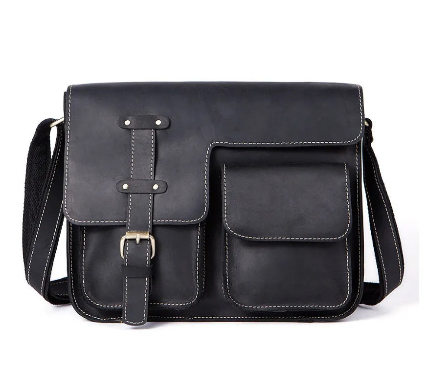 Brown leather vintage messenger bag with brass zipper and adjustable crossbody strap.