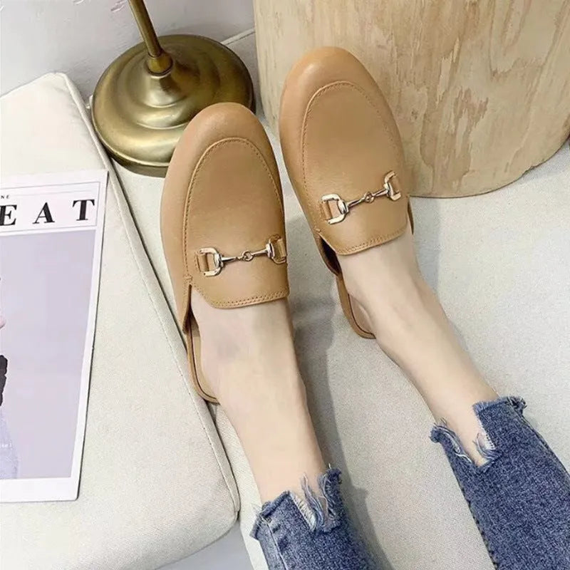 Women's closed toe half slippers in PVC with round toe and buckle fastening in multiple colour options