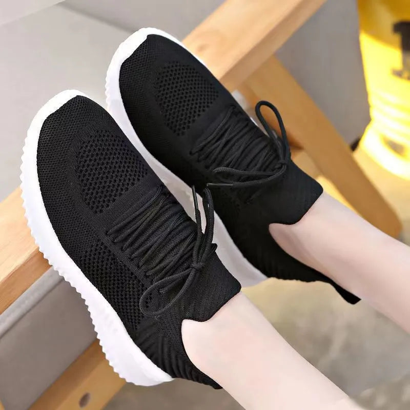 Flyknit breathable white low-top lace-up trainers for women with round toe and PVC sole