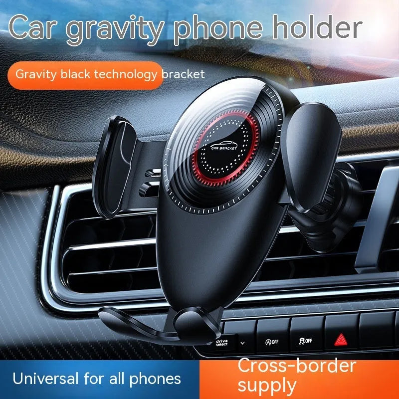 Black universal car phone bracket clipped to car air vent holding smartphone
