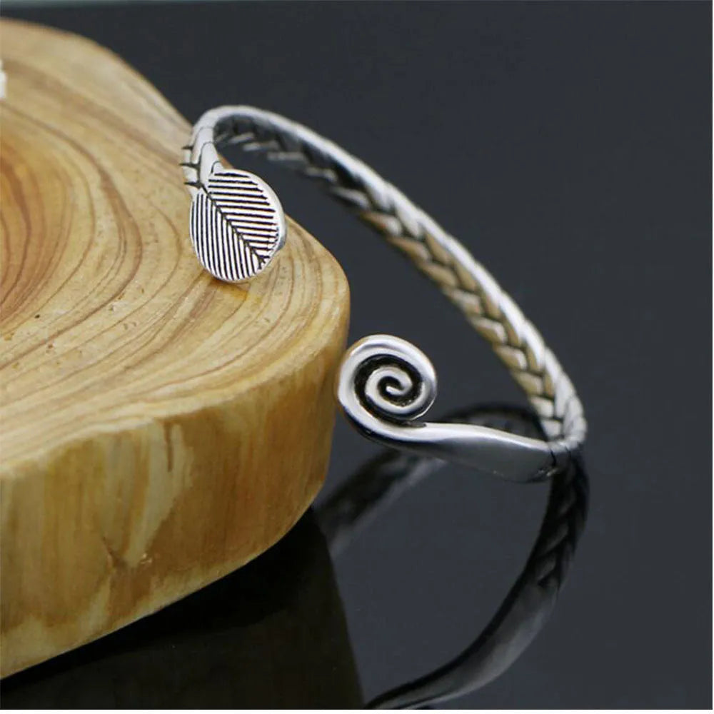 Women's Chinese retro style opening bracelet with fish charms in silver electroplated finish