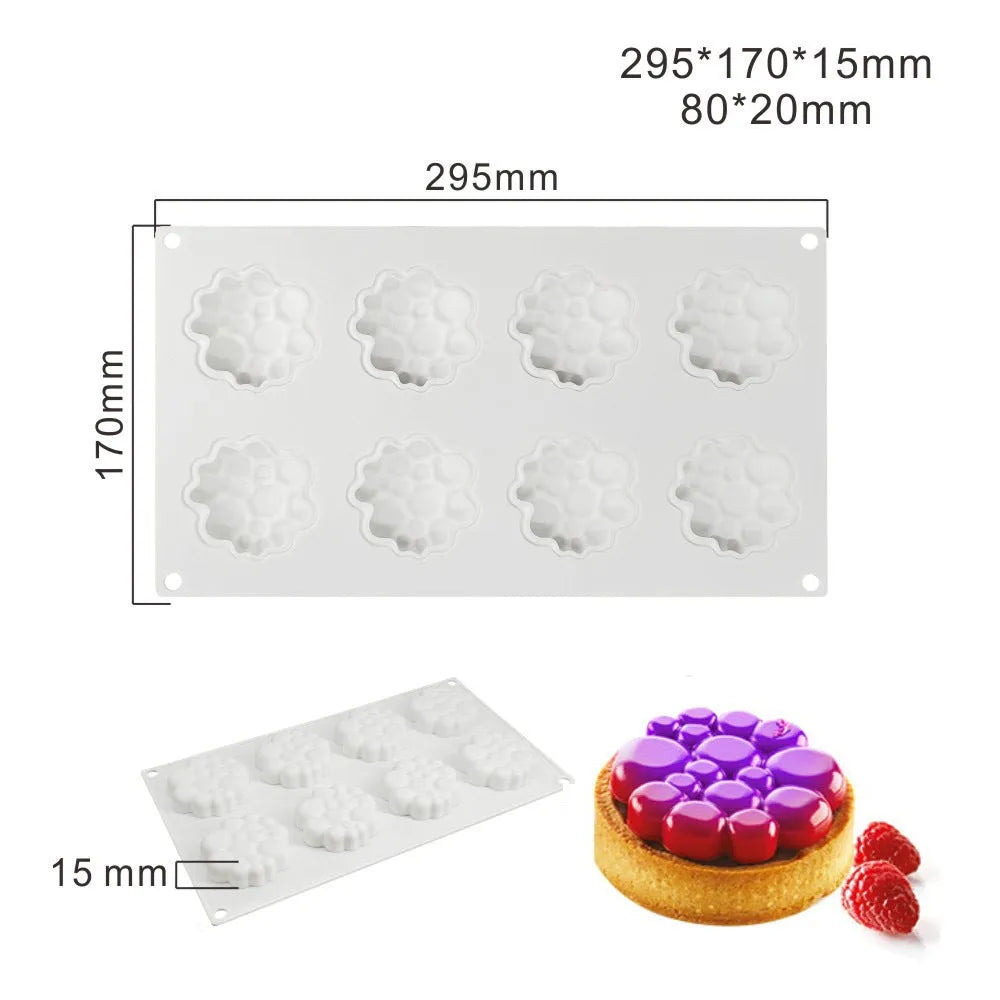 Round silicone baking mould with 8-bubble patterned base for cakes and desserts.