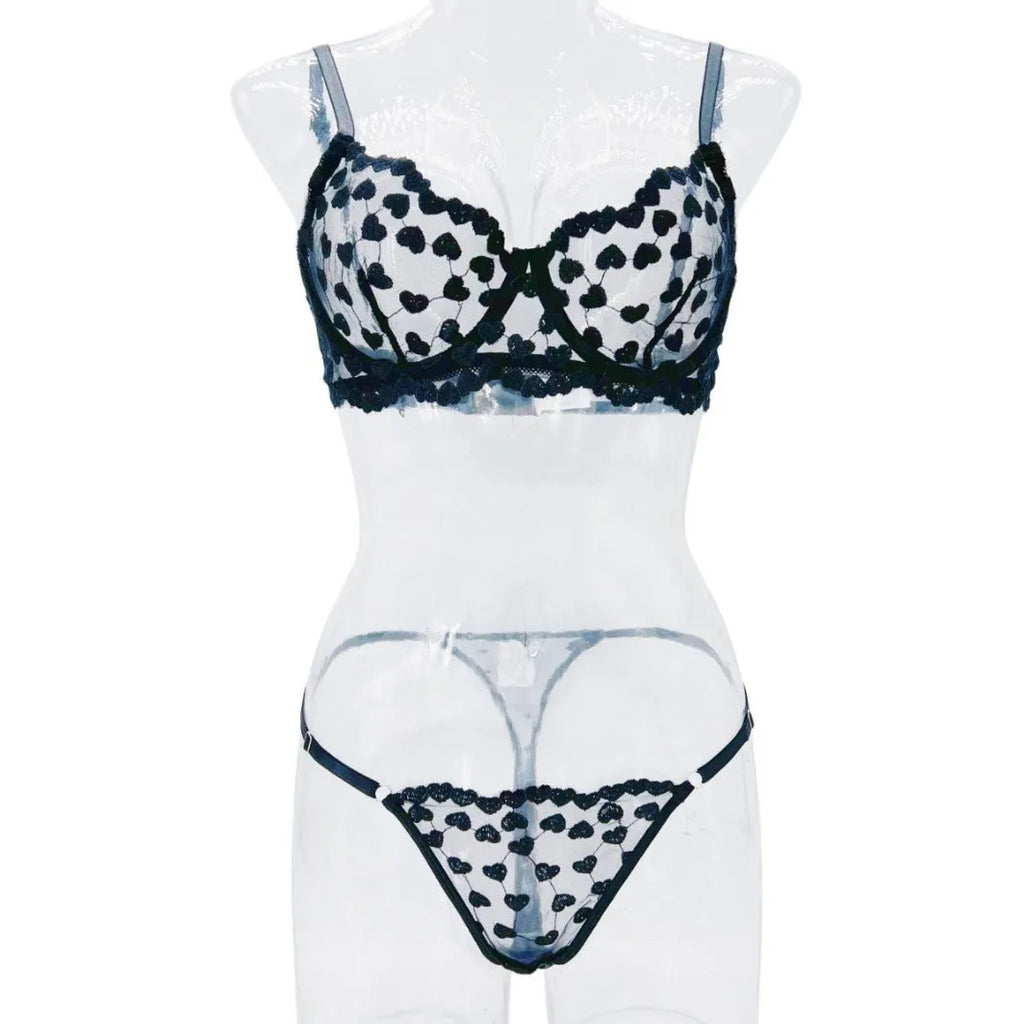 Women's black mesh two-piece suit with romantic multi-colour pattern showing cropped top and matching trousers
