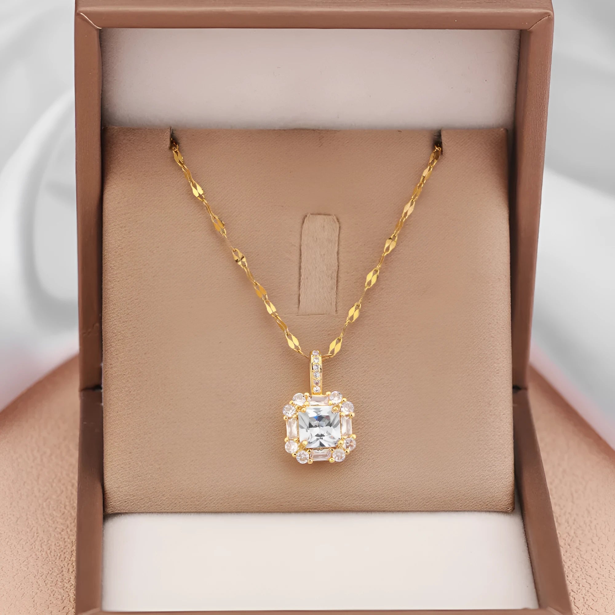Gold geometric zircon clavicle necklace on titanium steel water wave chain.