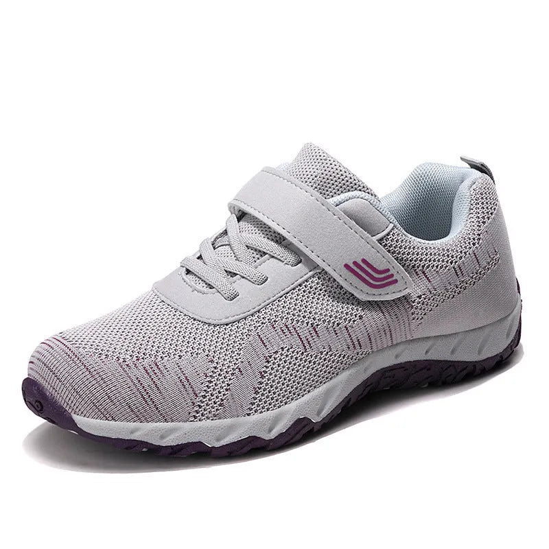 Women's low top wedge heel shoes with mesh upper and Velcro fastening in purple colour