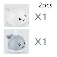 Automatic water spray whale bath toy with LED lights for baby sensory play