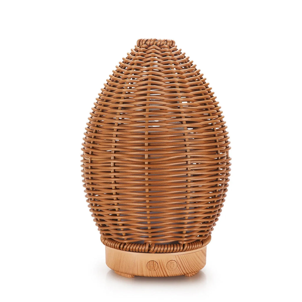 Hollow rattan design aroma diffuser with light wood grain base and 100ml capacity