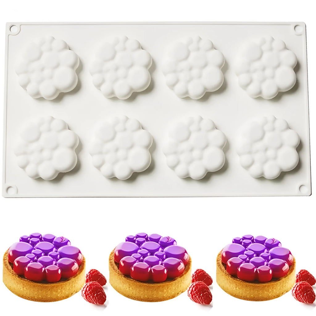 Round silicone baking mould with 8-bubble patterned base for cakes and desserts.
