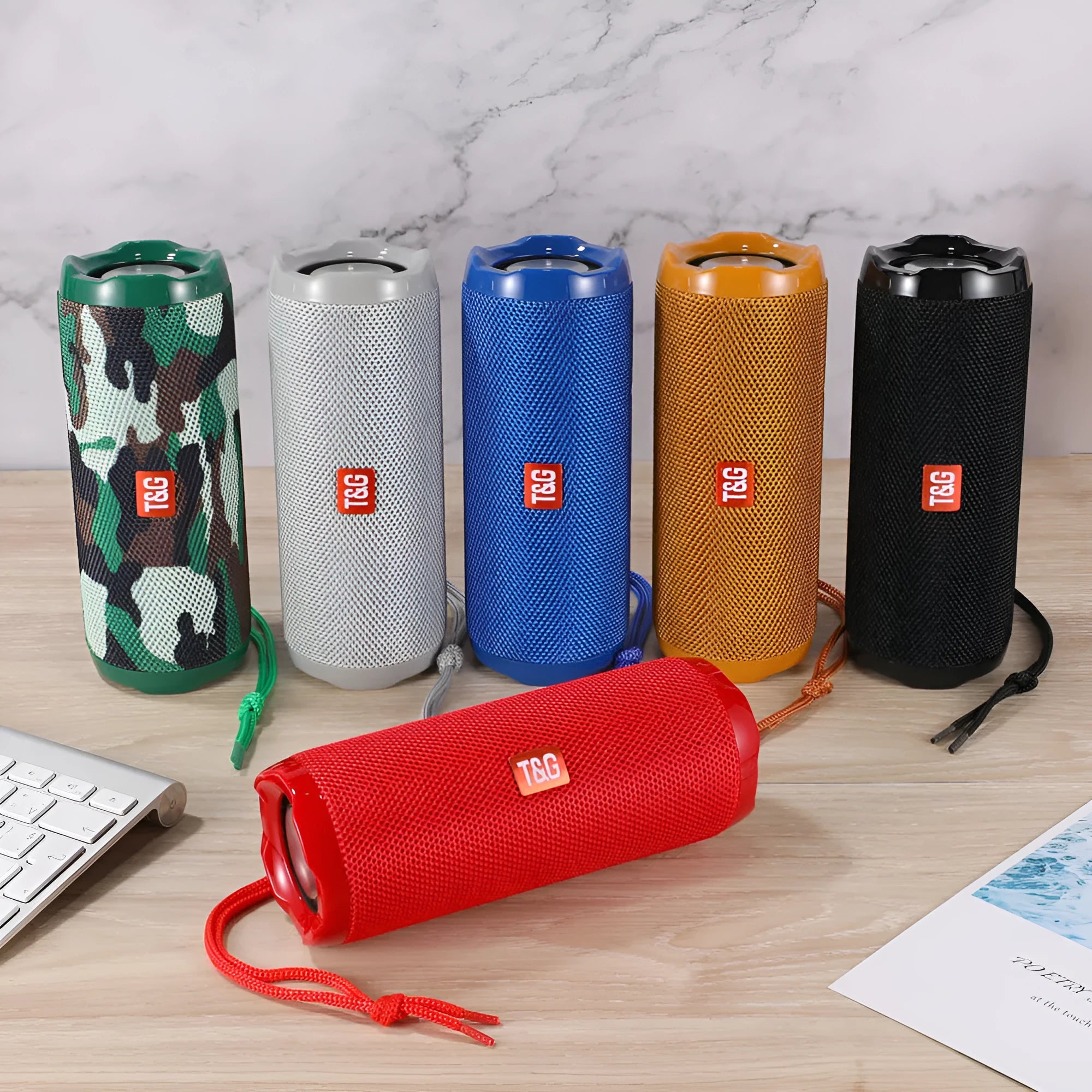 Fabric-covered portable Bluetooth speaker with card slot in camouflage colour.