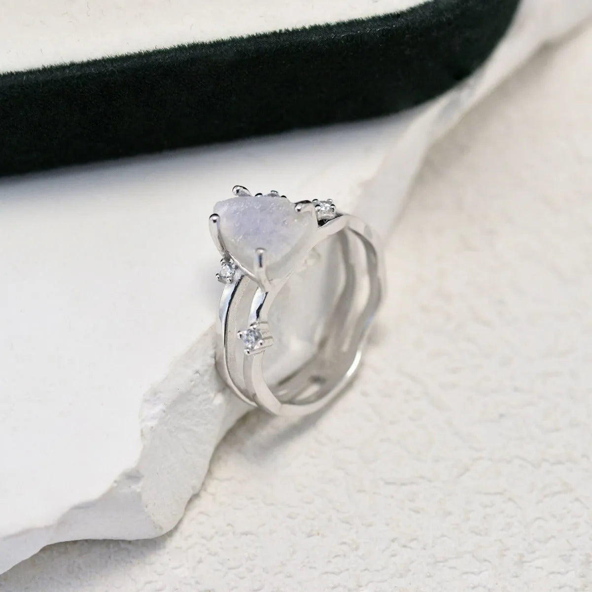 S925 silver geometric ring with an irregular triangle shape and moonstone setting in rose gold, white, or yellow gold colour.