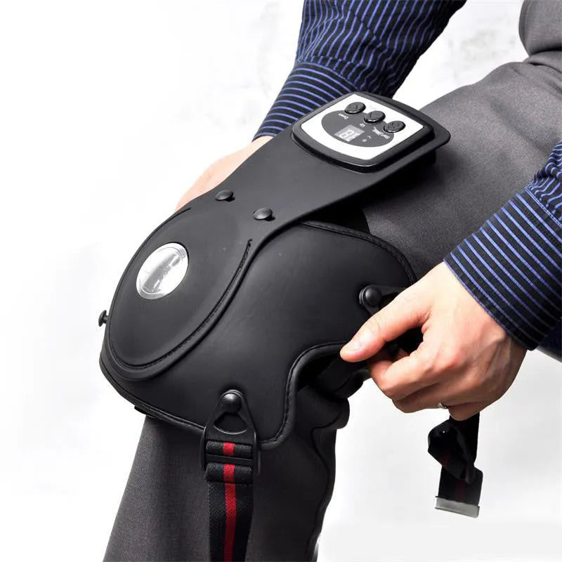 Infrared knee massager with knee pads and shoulder pads on grey background