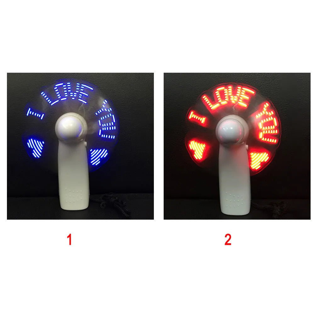 White handheld mini fan with blue and red LED lights spelling 'I love you' on a clear display.