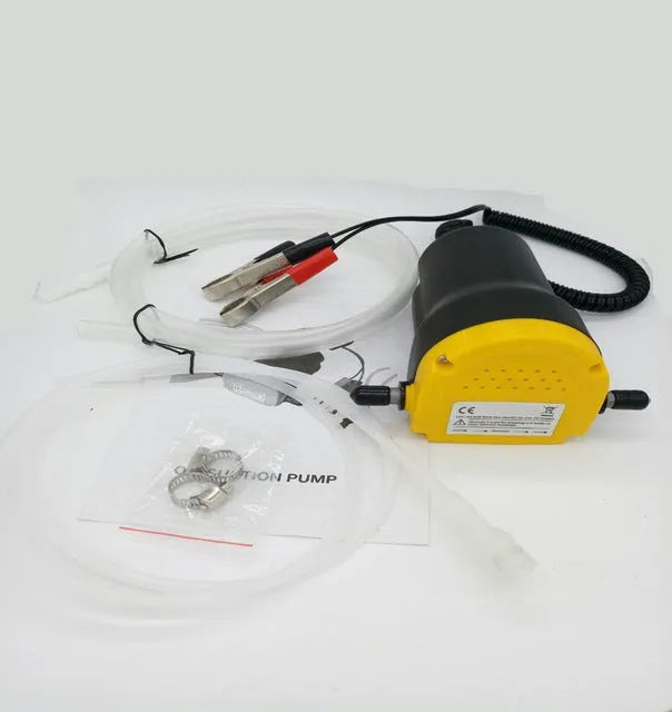 Yellow 12V electric self-priming pump with 2.5m battery clamps and hose set for diesel or oil transfer
