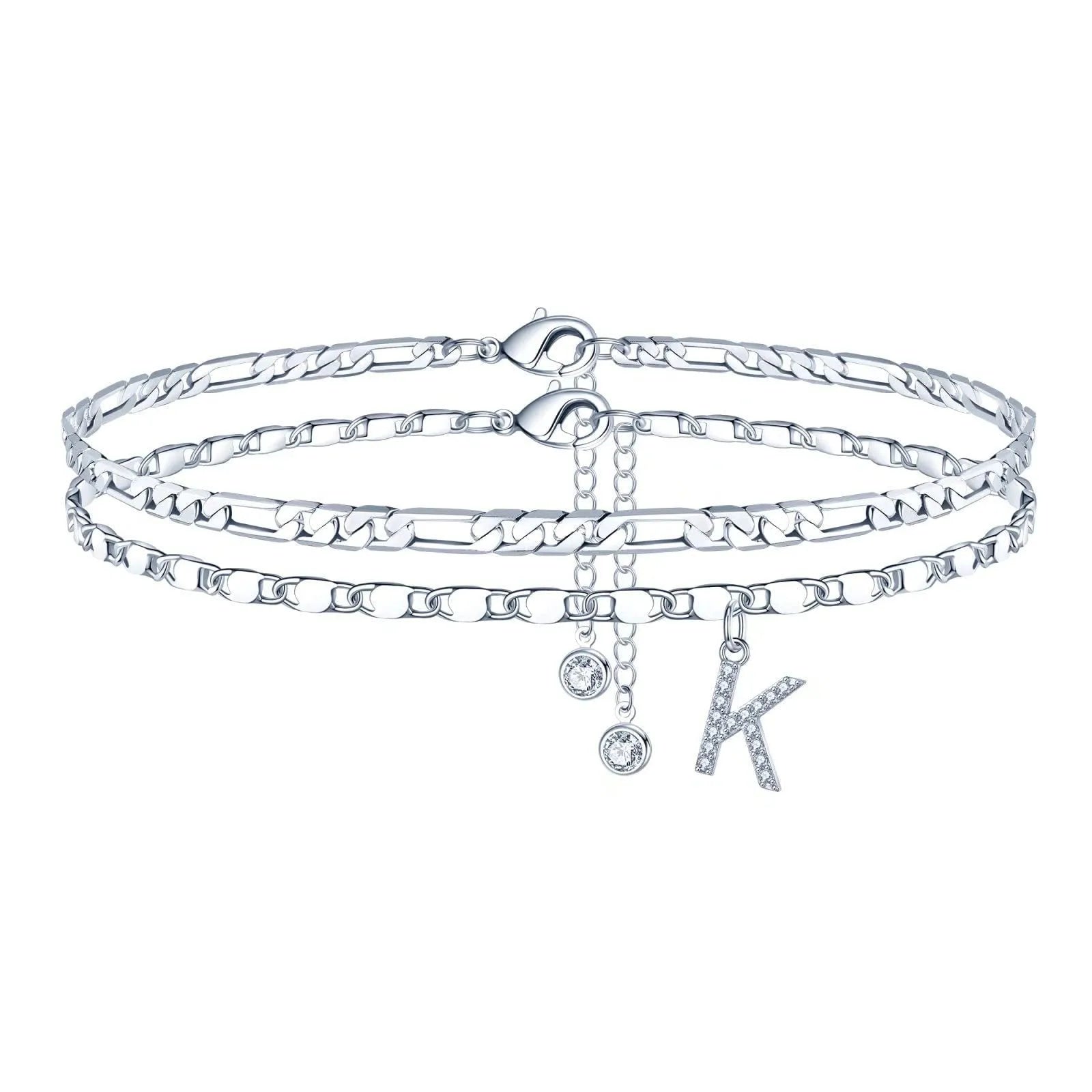 Silver-coloured copper anklet with a double-circle bead engraved with a letter.