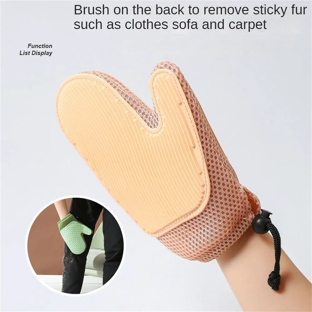 Pet grooming glove with mesh fabric and rubber grip bumps for removing hair during brushing or bathing