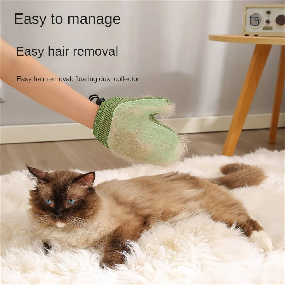 Pet grooming glove with mesh fabric and rubber grip bumps for removing hair during brushing or bathing