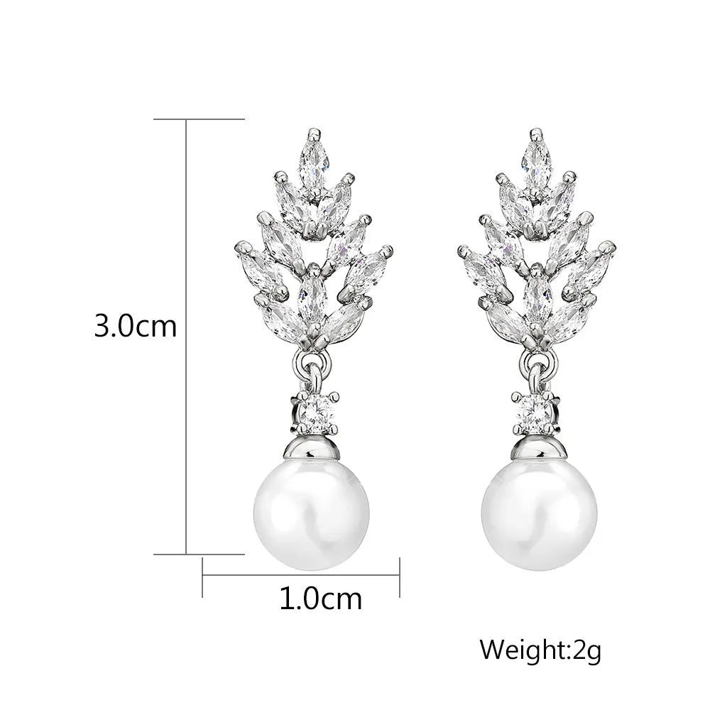 Micro inlaid zircon pearl earrings with geometric floral design in gold, platinum, or rose gold plating.