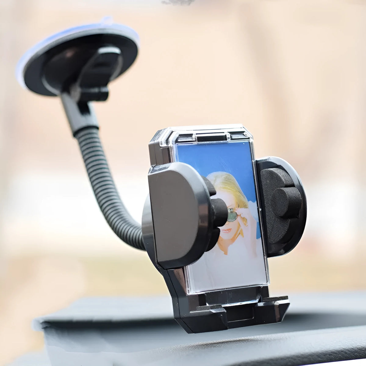 Black plastic car phone holder with suction cup bracket mount