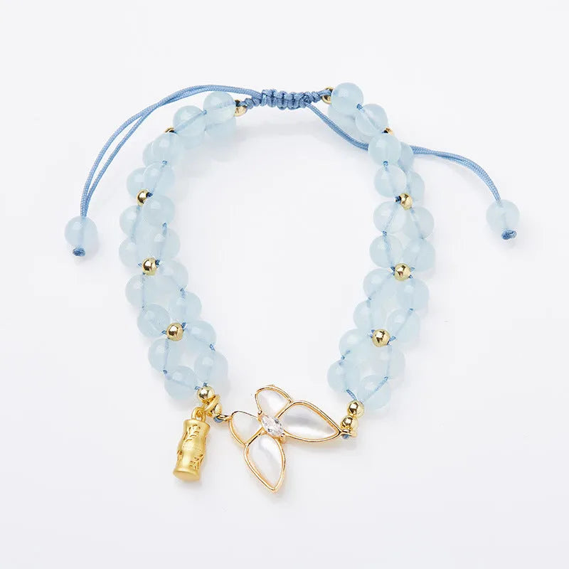Women's aquamarine butterfly woven bracelet with retro style and handmade construction