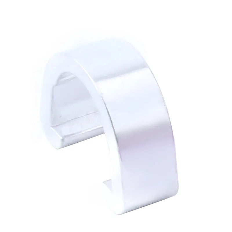 Ten small aluminium C-shaped buckles in assorted colours including black, blue, gold, and red.