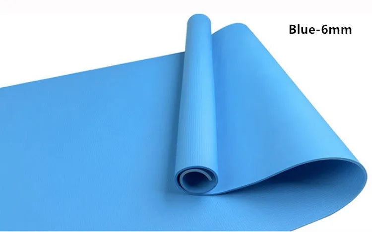 Red EVA fitness yoga mat with rolled edge showing thickness, alongside a blue mat and OPP storage bag.