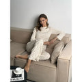 White floral print women's bell sleeve top and wide leg pants casual suit set