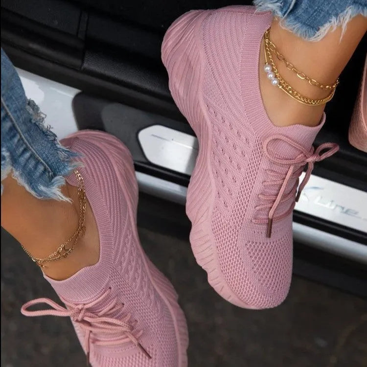 Women's thick-soled solid colour dad sneaker in multiple colour options on a white background.