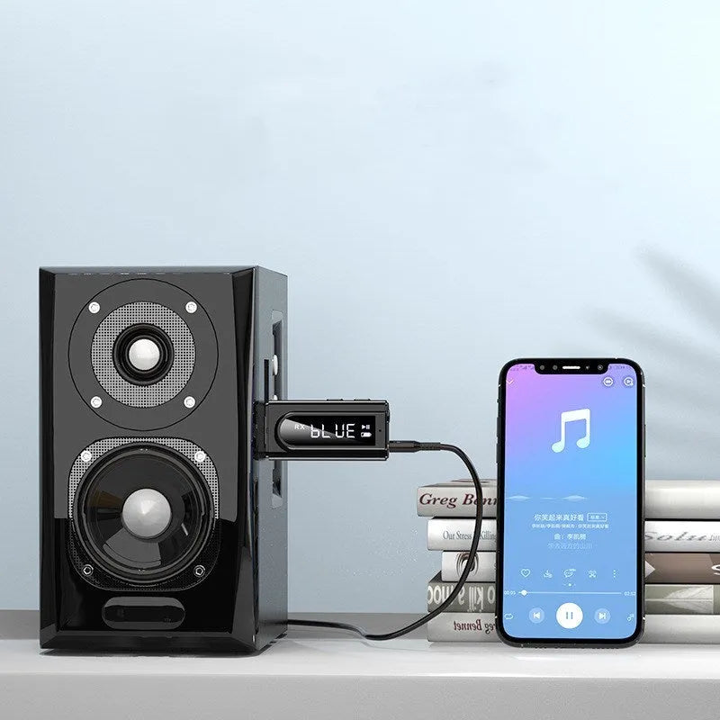 Black USB car FM Bluetooth receiver for wireless music playback and hands-free calls.