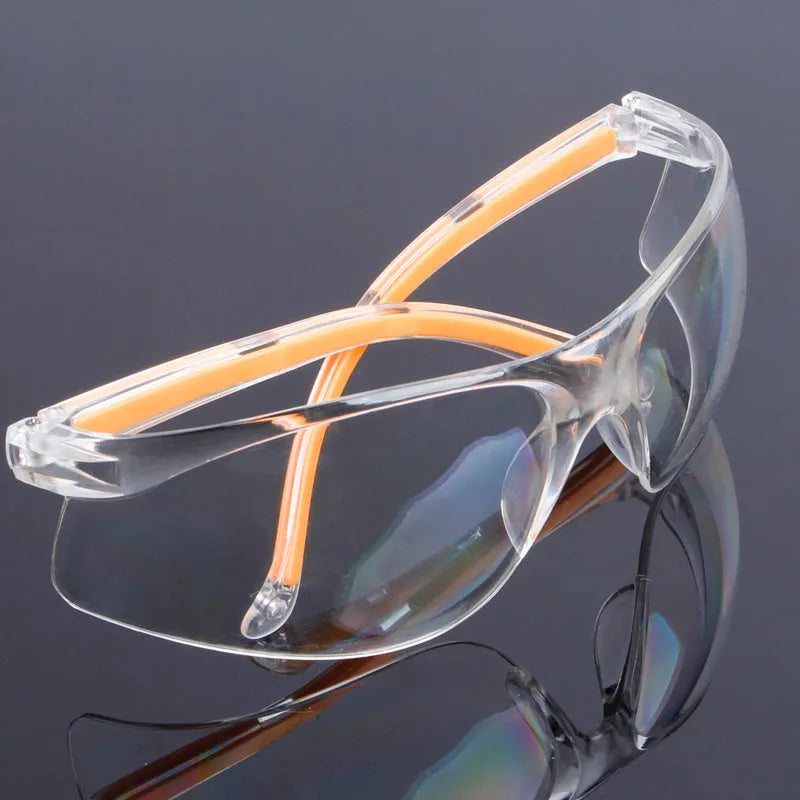 Transparent polycarbonate safety goggles with yellow tint lenses for laboratory and welding work