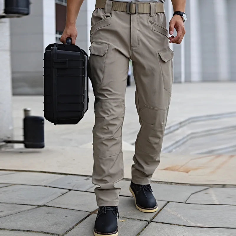 Men's camouflage stretch trousers in X9 khaki, loose fit, chemical fibre blend, outdoor wear