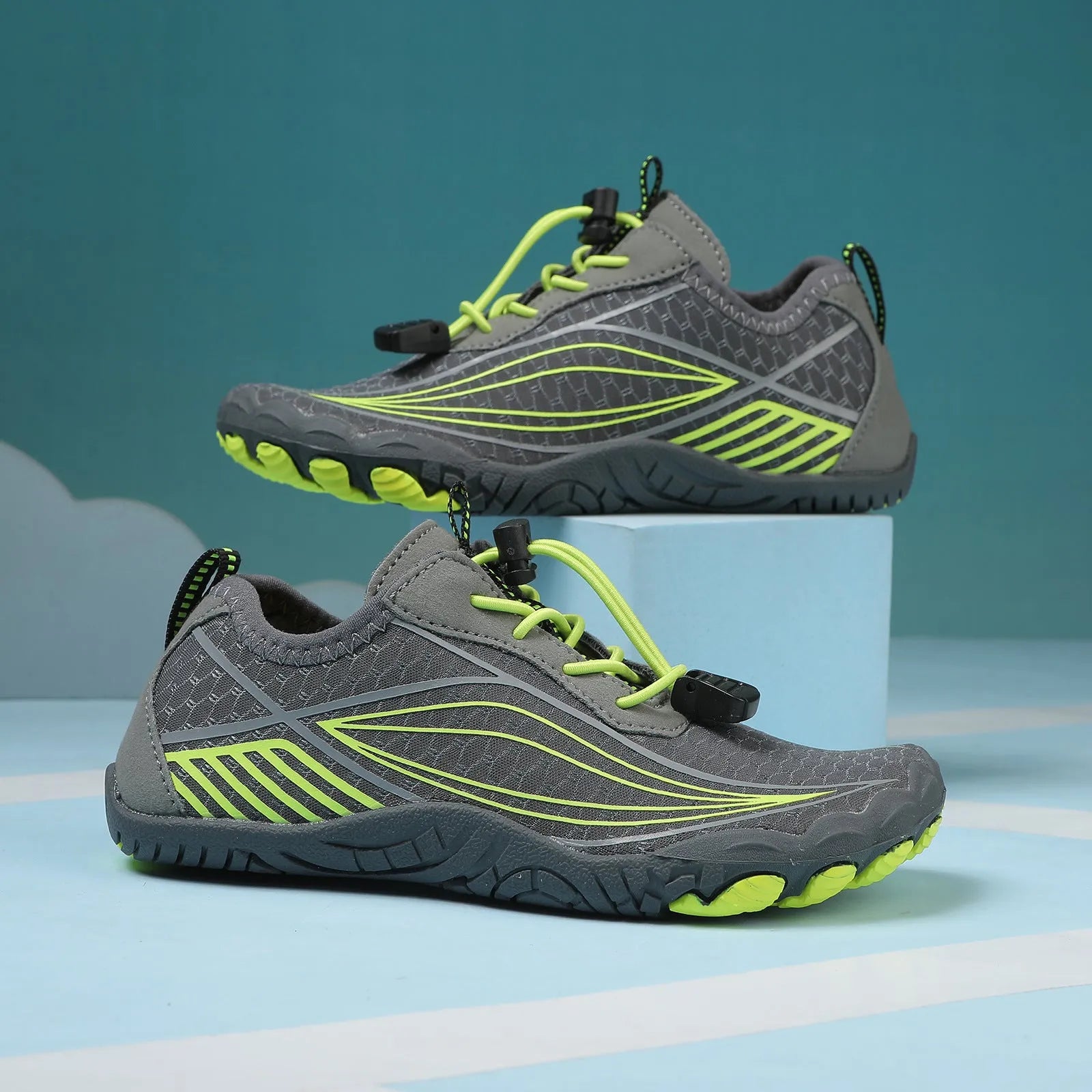 Children's black quick-dry water shoes with elastic band and rubber sole for outdoor swimming.