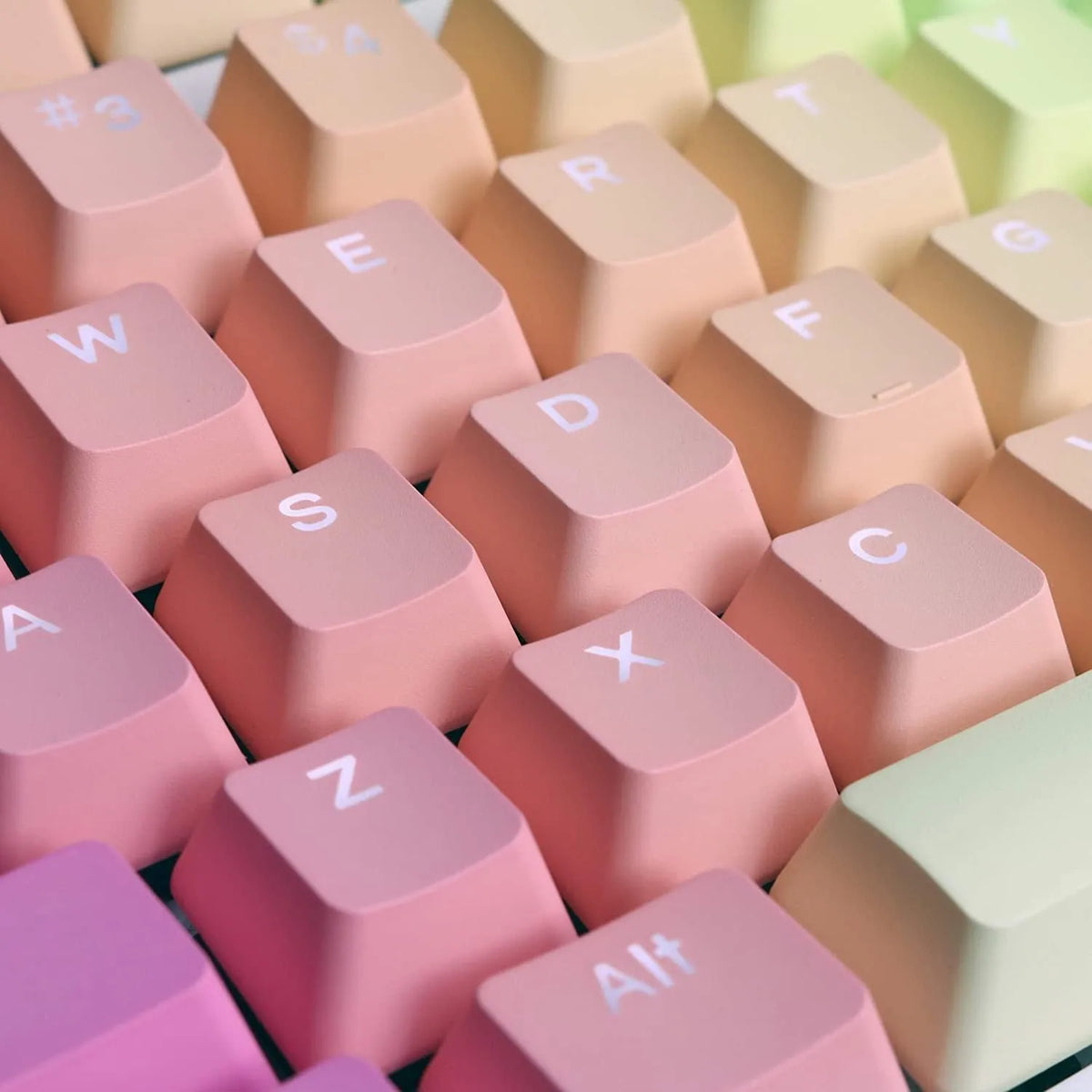 104 key set of PBT word penetration dyed keycaps in rainbow gradient style with translucent legends