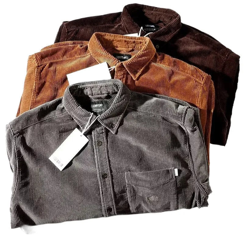 Caramel and grey loose fit long sleeve corduroy cardigan shirt on a hanger.