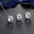 Bridal pendant and earring set with diamond-cut metal alloy finish on white background