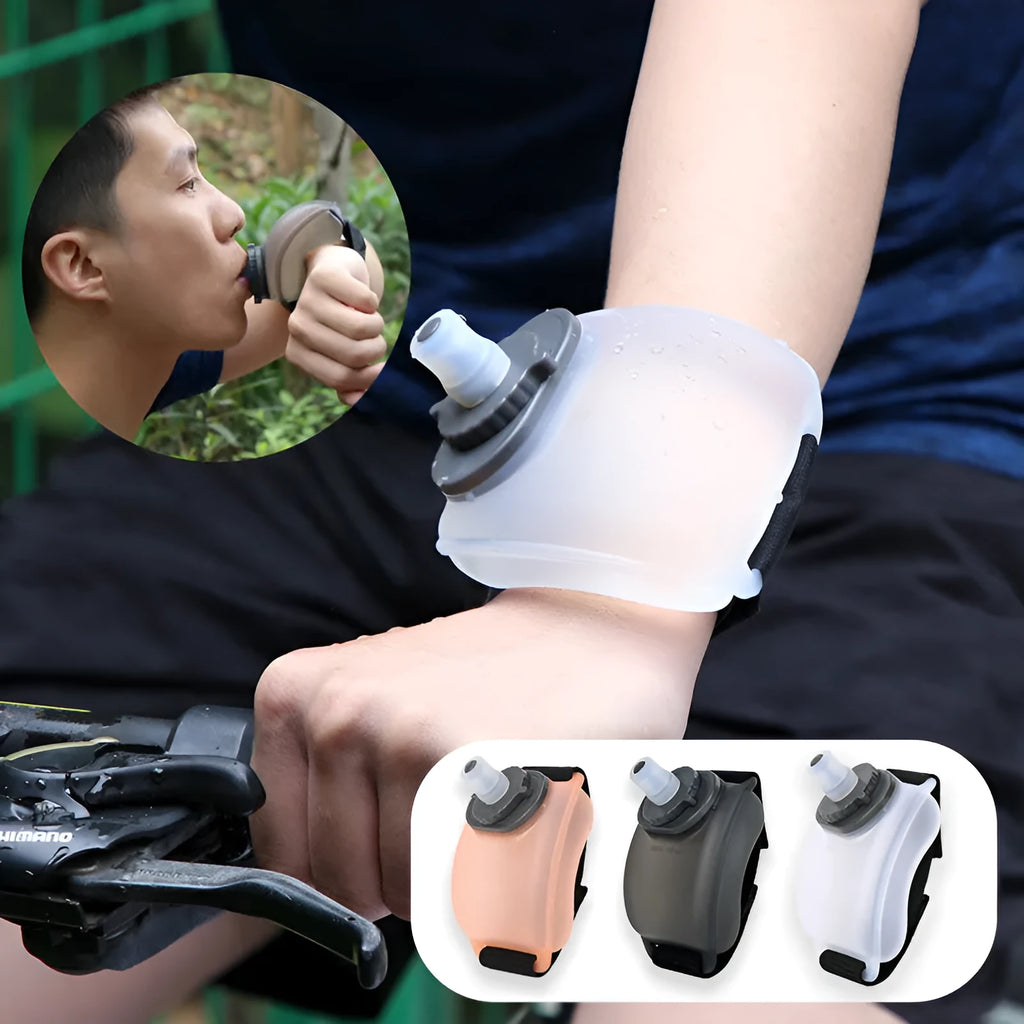 Orange wrist-mounted water bottle with Velcro strap shown on wrist during running activity