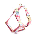 Pink colourful dog harness with gold buckle and heart-shaped stone decoration