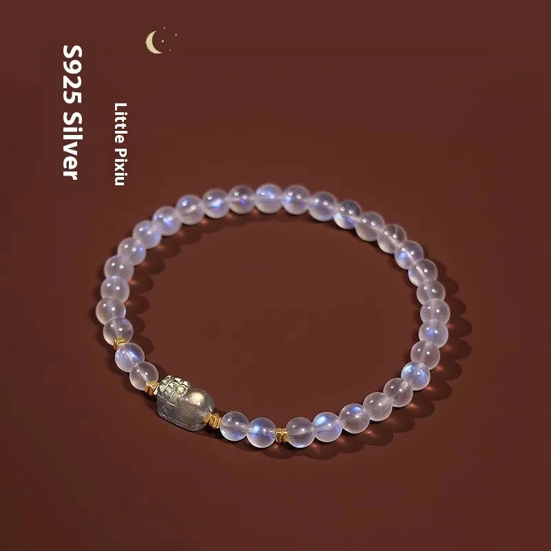 Moonstone bracelet with animal zodiac motif in national style design featuring blue light elements