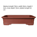 Large rectangular handmade purple clay flowerpot for indoor or outdoor plants