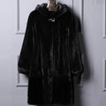 Women's black faux fur hooded casual coat for autumn and winter street fashion.
