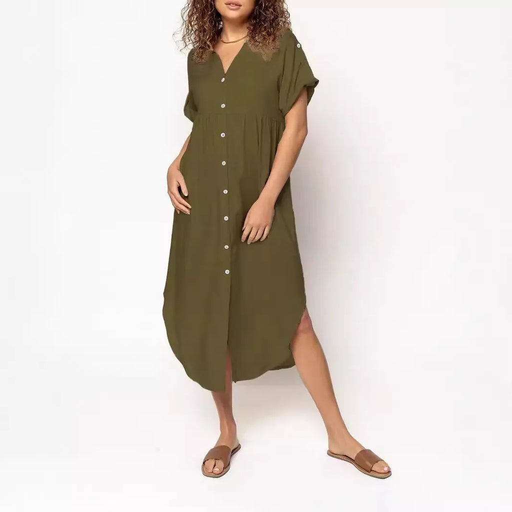 Loose fit solid colour midi dress with decorative buttons on a hanger