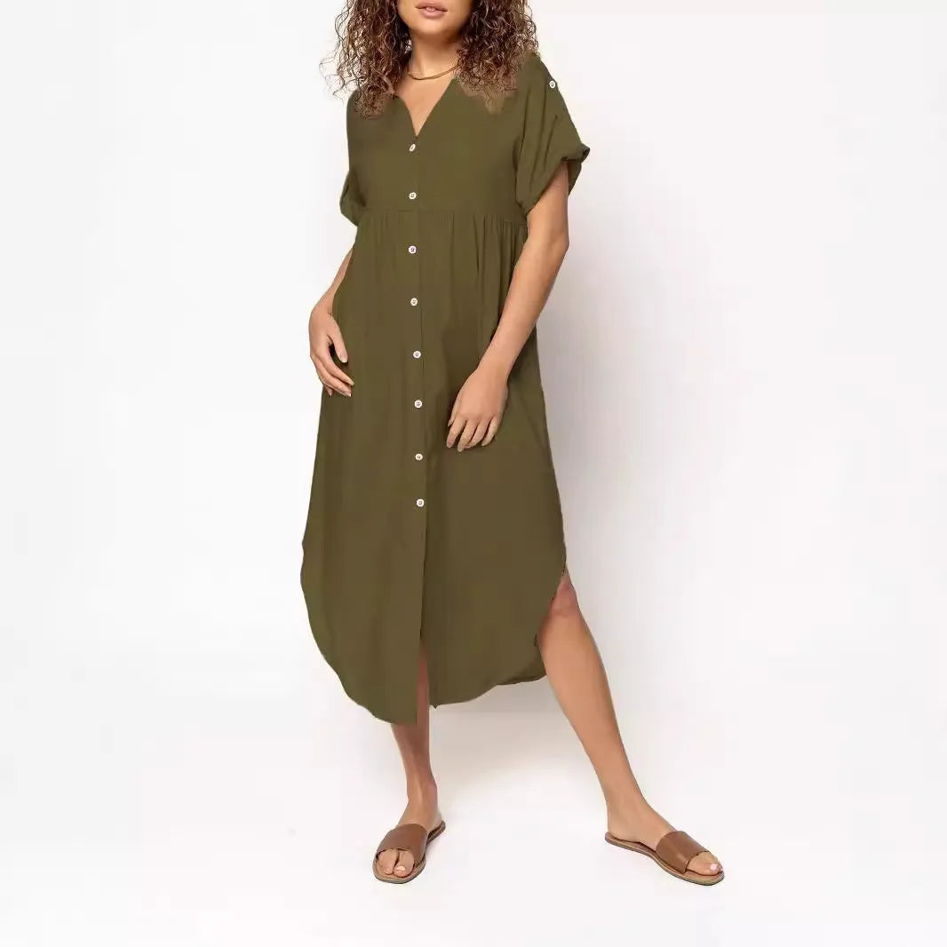 Loose fit solid colour midi dress with decorative buttons on a hanger