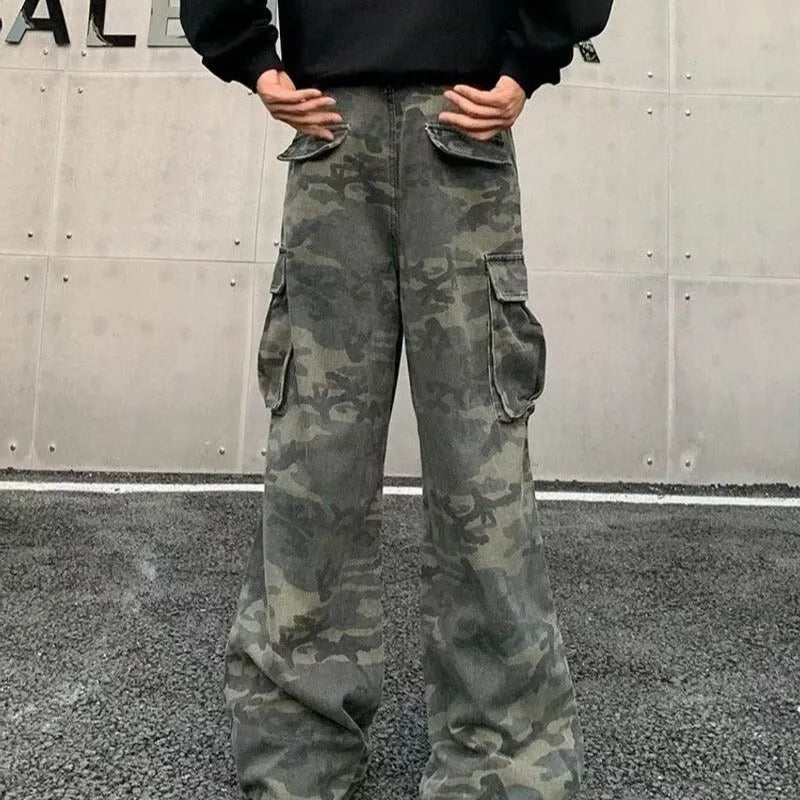 Korean style washed camouflage cargo trousers with multiple pockets on a mid-waist fit.
