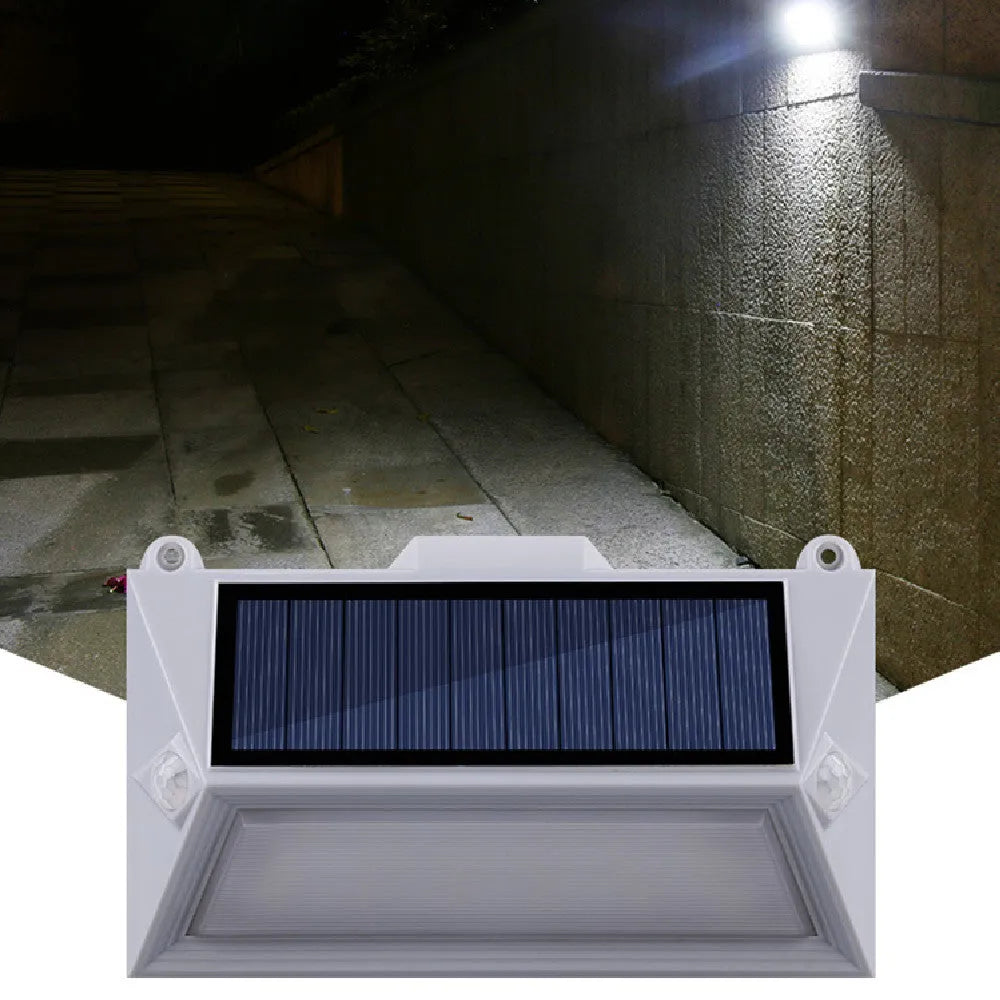 Solar outdoor human body induction guide step light with abstract design for courtyard and stair installation