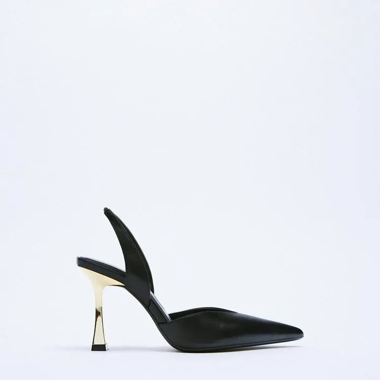 Women's pointed-toe patent leather high heels in apricot and black, showing shallow-cut vamp design.