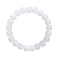 Handmade white Hetian jade barrel bead bracelet for men and women on a wrist.